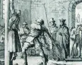 Ein Mann peitscht eine aufgehängte Frau, während Zuschauer, darunter Geistliche, zusehen. Eine Szene, die an die Schrecken der Hexenverbrennung erinnert.