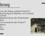 Ein LKW mit Soldaten, die den Kapp-Lüttwitz-Putsch 1920 darstellen, fährt durch eine Straße.