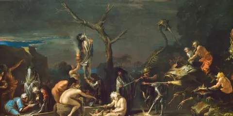 Szene mit mittelalterlichen Hexen, die einen Toten am Baum aufhängen und einen seltsamen Kult praktizieren.