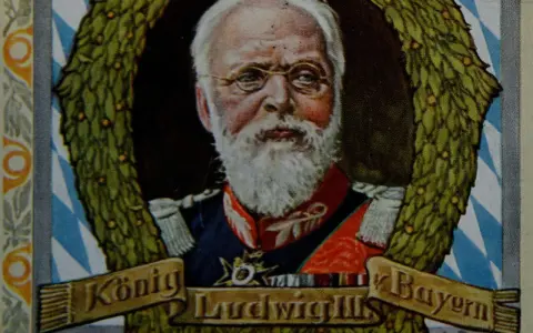 König Ludwig III. von Bayern, mit weißem Bart und Brille, umrahmt von einem Lorbeerkranz.